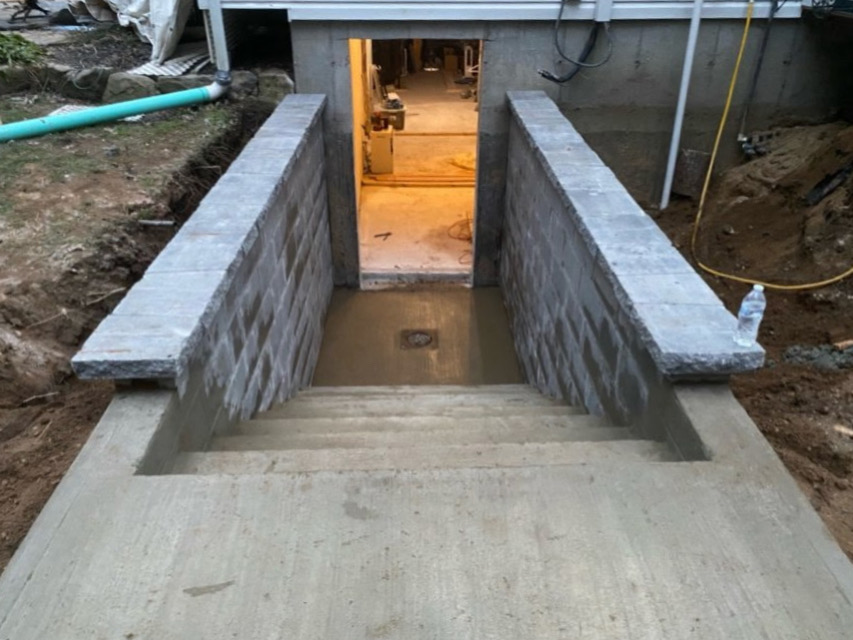 Basement Entry & Steps completed by Colonial Crete in Long Island, NY